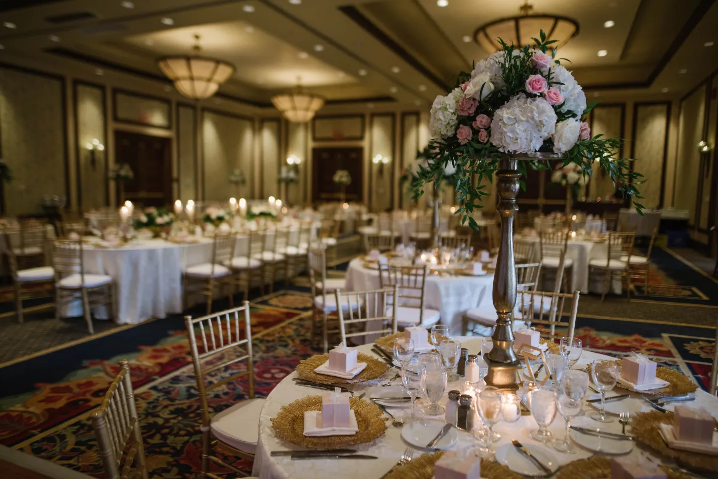 A grand hotel ballroom set for a wedding reception