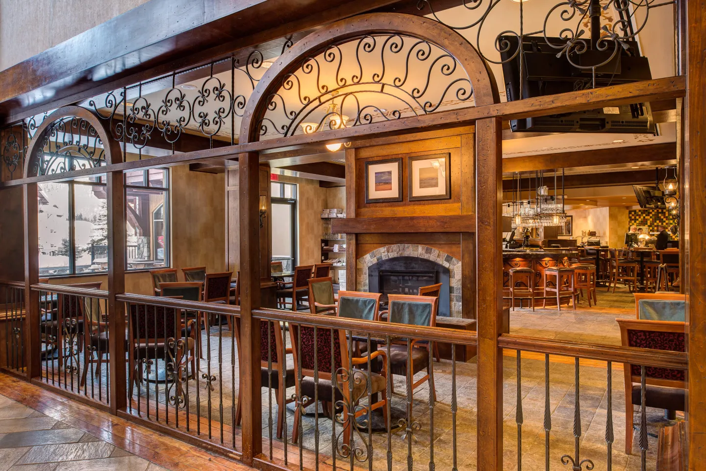 A restaurant with old fashioned wood furnishings and decor