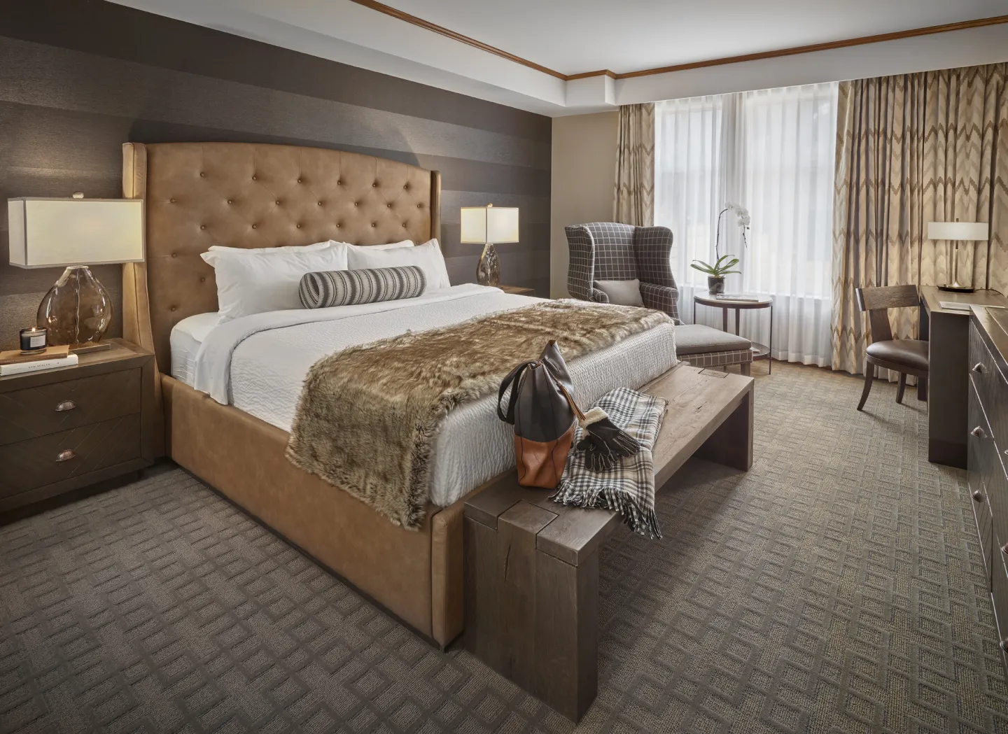 Well appointed primary bedroom with ensuite and ample storage space