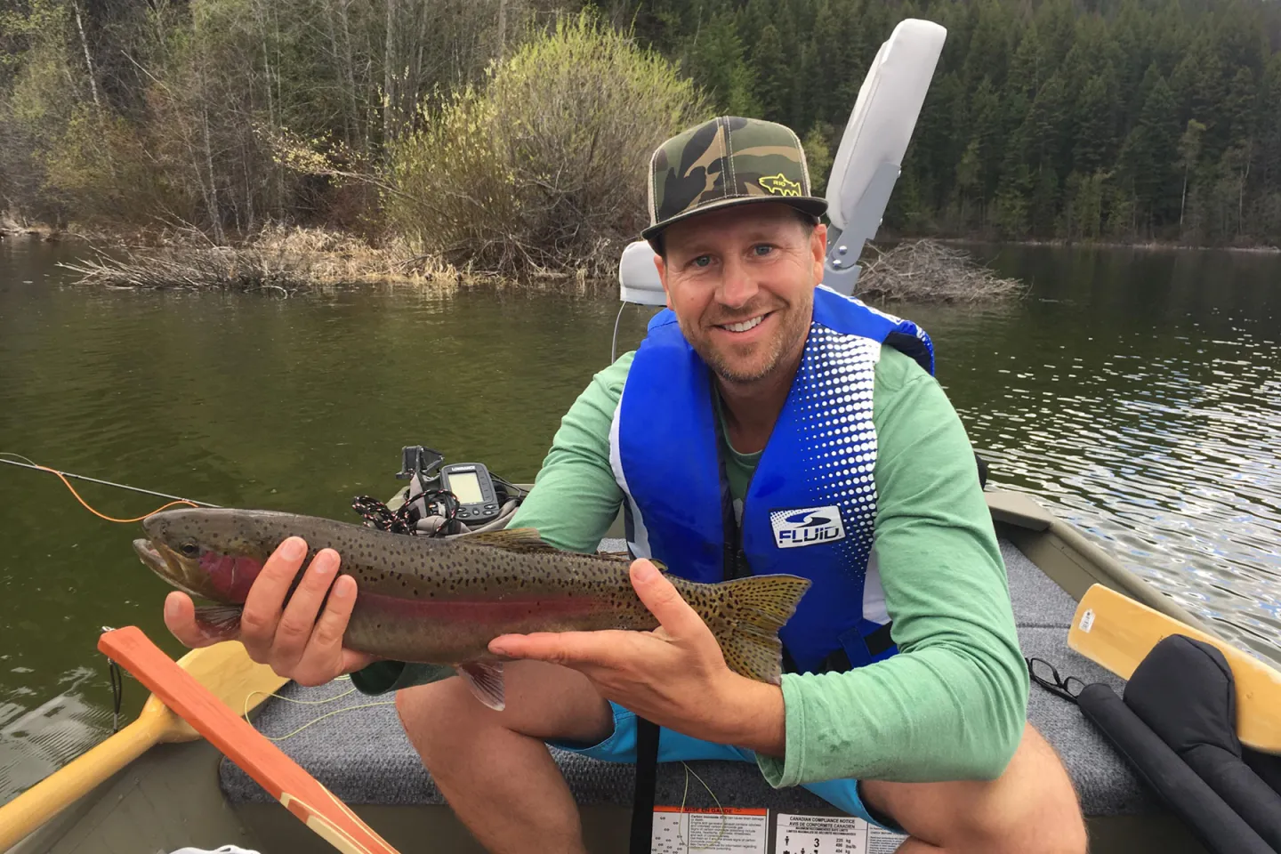 Fisherman holding a fish