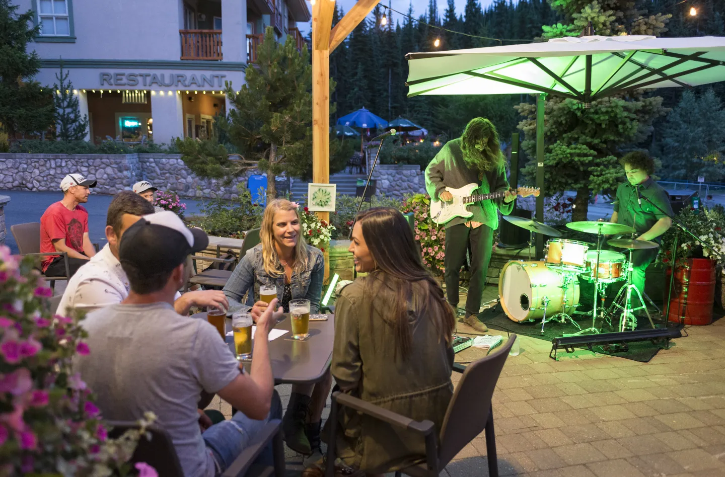 Evening outdoor patio of Morrisey's Public House with live music