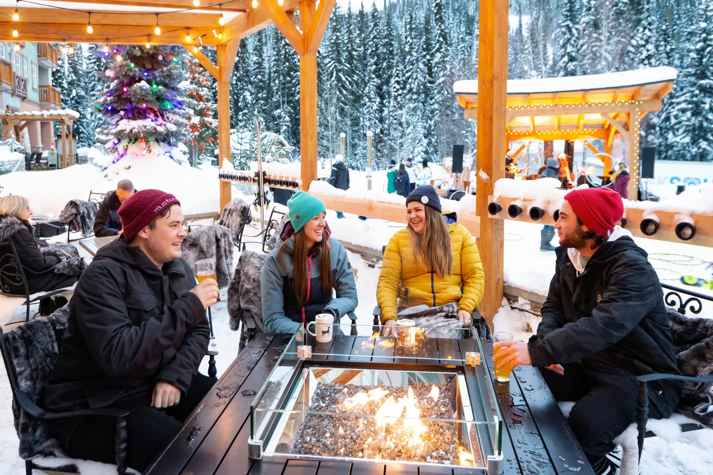 People around a fire pit on the patio