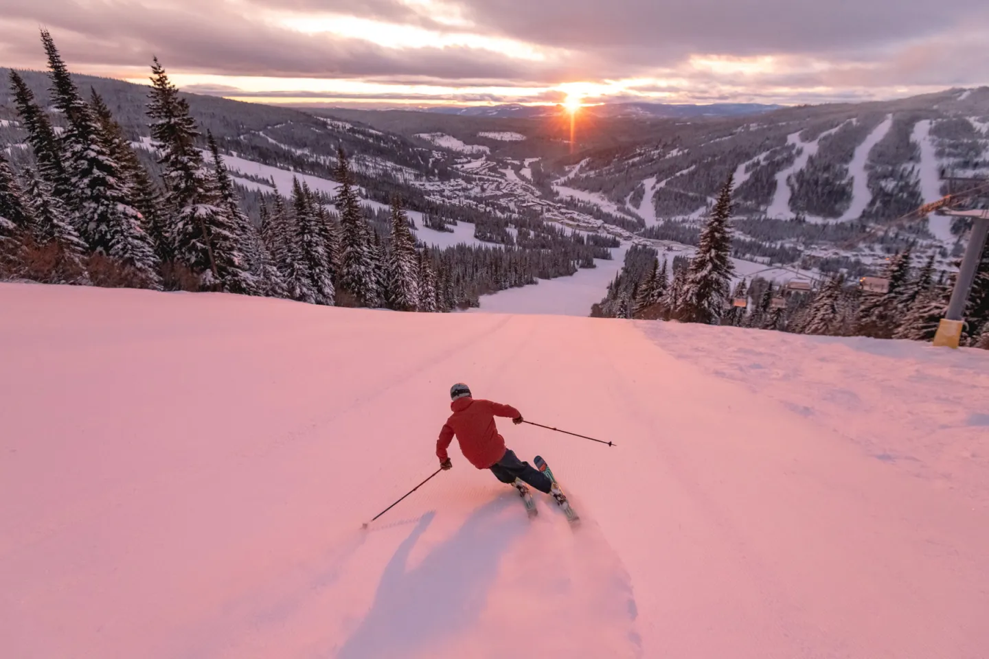 Skier on groomoed run