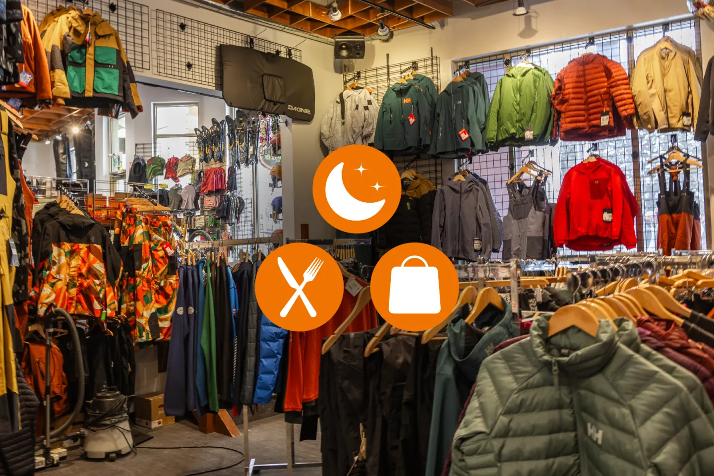 Clothing store with colorful jackets on racks and orange icons overlayed.